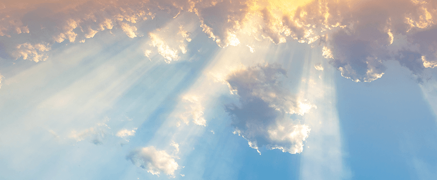 Sun shining through clouds