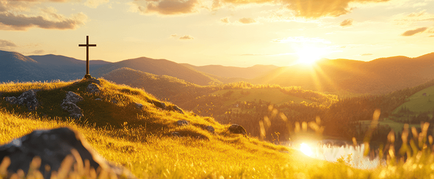 Cross on sunny hills